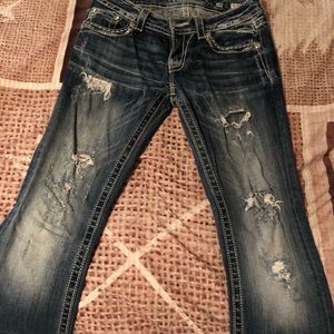 Size 28 miss me jeans with holes.